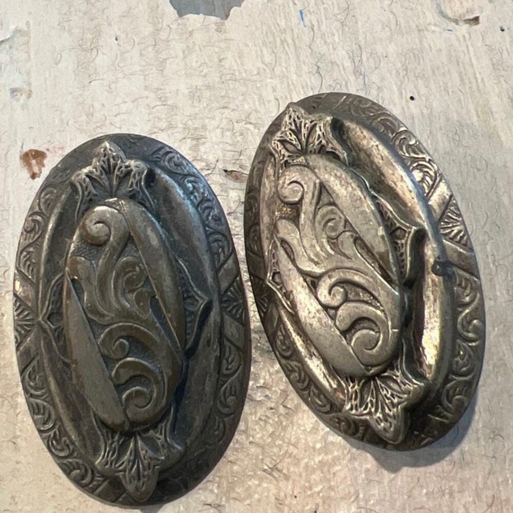 Vintage oval shaped silver toned metal earrings